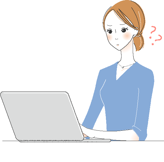 パソコンの前で悩む女性